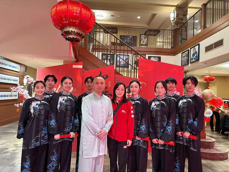 Group photo under red lanterns